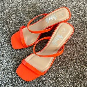 Size 7 women’s Orange wedges